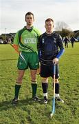 30 October 2010; Ireland captain Eoin Reilly, left, and Scotland captain Michael Rodger before the game. U21 Shinty - Hurling International Final, Ireland v Scotland, Ratoath GAA Club, Ratoath, Co. Meath. Picture credit: Barry Cregg / SPORTSFILE