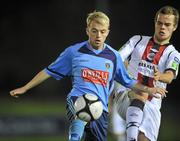 1 November 2010; Keith Ward, UCD, in action against Stephen Chambers, Bohemians. Newstalk A Championship Final, UCD v Bohemians, Belfield Bowl, UCD, Dublin. Picture credit: David Maher / SPORTSFILE