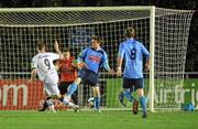 1 November 2010; Paddy Madden, Bohemians, beats Michael Leahy and goalkeeper Ger Barron, UCD, to score his side's first goal. Newstalk A Championship Final, UCD v Bohemians, Belfield Bowl, UCD, Dublin. Picture credit: David Maher / SPORTSFILE