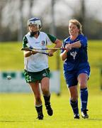 30 October 2010; Rosie Crowe, Ireland, in action against Jane Nicol, Scotland. Ladies Shinty / Camogie International, Ireland v Scotland, Ratoath GAA Club, Ratoath, Co. Meath. Picture credit: Alan Place / SPORTSFILE