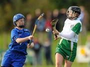 30 October 2010; Colette McSorley, Ireland, in action against Elaine Wink, Scotland. U21 Shinty - Hurling International Final, Ireland v Scotland, Ratoath GAA Club, Ratoath, Co. Meath. Picture credit: Alan Place / SPORTSFILE