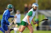 30 October 2010; Roisin O'Keefe, Ireland, in action against Yvonne Connaughton, Scotland. Ladies Shinty / Camogie International, Ireland v Scotland, Ratoath GAA Club, Ratoath, Co. Meath. Picture credit: Alan Place / SPORTSFILE