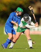30 October 2010; Laura Gribben, Ireland, in action against Siobhan Martin, Scotland. Ladies Shinty / Camogie International, Ireland v Scotland, Ratoath GAA Club, Ratoath, Co. Meath. Picture credit: Alan Place / SPORTSFILE