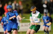 30 October 2010; Claire Coffey, Ireland, in action against Elaine Wink, Scotland. Ladies Shinty / Camogie International, Ireland v Scotland, Ratoath GAA Club, Ratoath, Co. Meath. Picture credit: Alan Place / SPORTSFILE