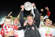 30 October 2010; Derry City manager Stephen Kenny and his players celebrate with the Airtricity League First Division Trophy. Airtricity League First Division, Monaghan United v Derry City, Gortakeegan, Monaghan. Picture credit: Oliver McVeigh / SPORTSFILE