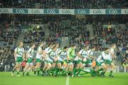 30 October 2010; The Ireland team break from the team photograph before the game. Irish Daily Mail International Rules Series 2nd Test, Ireland v Australia, Croke Park, Dublin. Picture credit: Diarmuid Greene / SPORTSFILE