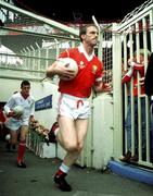 16 September 1990; Cork captain Larry Tompkins, followed by team-mate John Kerins, leads his side onto the pitch prior to the All-Ireland Senior Football Championship Final match between Cork and Meath at Croke Park in Dublin. Photo by Ray McManus/Sportsfile