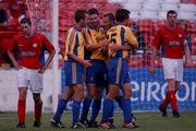 23 August 2001; Peter Madsen, second from left, celebrates with his Brondby team-mates, from left, Mads Jorgensen, Aurelijus Skarbalius, Kenneth Rasmussen and Ruban Bagger after scoring his side's third goal as Shelbourne players Owen Heary, left, and Jim Gannon react during the UEFA Cup First Qualifying Round 2nd leg match between Shelbourne and Brondby at Tolka Park in Dublin. Photo by David Maher/Sportsfile