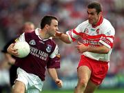 26 August 2001; Derek Savage of Galway in action against Sean Martin Lockhart of Derry during the Bank of Ireland All-Ireland Senior Football Championship Semi-Final match between Galway and Derry at Croke Park in Dublin. Photo by Ray McManus/Sportsfile