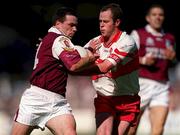 26 August 2001; Padraig Joyce of Galway in action against Kevin McCloy of Derry during the Bank of Ireland All-Ireland Senior Football Championship Semi-Final match between Galway and Derry at Croke Park in Dublin. Photo by Brendan Moran/Sportsfile
