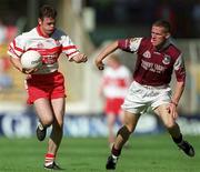 26 August 2001; Paul McFlynn of Derry is tackled by Seán Óg de Paor of Galway during the Bank of Ireland All-Ireland Senior Football Championship Semi-Final match between Galway and Derry at Croke Park in Dublin. Photo by Ray McManus/Sportsfile