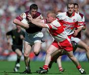 26 August 2001; Jarlath Fallon of Galway is tackled by Gareth Doherty of Derry during the Bank of Ireland All-Ireland Senior Football Championship Semi-Final match between Galway and Derry at Croke Park in Dublin. Photo by Brendan Moran/Sportsfile