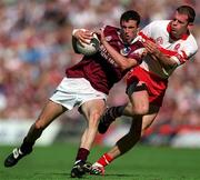 26 August 2001; Joe Bergin of Galway in action against Anthony Tohill of Derry during the Bank of Ireland All-Ireland Senior Football Championship Semi-Final match between Galway and Derry at Croke Park in Dublin. Photo by Brendan Moran/Sportsfile
