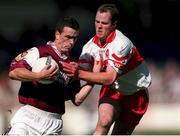 26 August 2001; Padraig Joyce of Galway in action against Derry's Kevin McCloy during the Bank of Ireland All-Ireland Senior Football Championship Semi-Final match between Galway and Derry at Croke Park in Dublin. Photo by Brendan Moran/Sportsfile