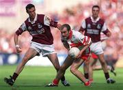 26 August 2001; Fergal Crossan of Derry in action against Joe Bergin of Galway during the Bank of Ireland All-Ireland Senior Football Championship Semi-Final match between Galway and Derry at Croke Park in Dublin. Photo by Brendan Moran/Sportsfile