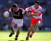 26 August 2001; Alan Kerins of Galway in action against Derry's Jonathan Niblock during the Bank of Ireland All-Ireland Senior Football Championship Semi-Final match between Galway and Derry at Croke Park in Dublin. Photo by Ray McManus/Sportsfile