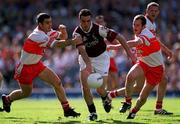 26 August 2001; Padraig Joyce of Galway in action against Sean Martin Lockhart, left, and Kevin McCloy of Derry during the Bank of Ireland All-Ireland Senior Football Championship Semi-Final match between Galway and Derry at Croke Park in Dublin. Photo by Ray McManus/Sportsfile