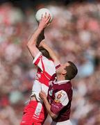 26 August 2001; Gary Fahey of Galway in action against Enda Muldoon of Derry during the Bank of Ireland All-Ireland Senior Football Championship Semi-Final match between Galway and Derry at Croke Park in Dublin. Photo by Brendan Moran/Sportsfile