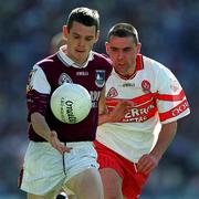 26 August 2001; Galway's Declan Meehan in action against Kieran McNally of Derry during the Bank of Ireland All-Ireland Senior Football Championship Semi-Final match between Galway and Derry at Croke Park in Dublin. Photo by Ray McManus/Sportsfile