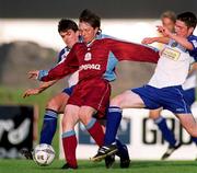 26 August 2001; Bobby Ryan of Galway United in action against Monaghan United's Mick Scully and Darren McKenna during the eircom League Premier Division match between Monaghan United and Galway United at Century Homes Park in Monaghan. Photo by David Maher/Sportsfile
