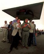 1 August 2001; Punters during day three of the Galway Summer Racing Festival at Ballybrit Racecourse in Galway. Photo by Aoife Rice/Sportsfile