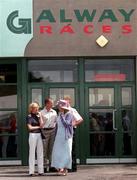 2 August 2001; Racegoers during Ladies Day of the Galway Summer Racing Festival at Ballybrit Racecourse in Galway. Photo by Damien Eagers/Sportsfile