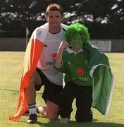 28 August 2001; The FAI today urged Irish fans to &quot;Go Green for Ireland&quot; in the run up to the Republic of Ireland's crucial FIFA World Cup Qualifier against Holland on Saturday next. Lending their support is Republic of Ireland's Robbie Keane and Brian Barrington at John Hyland Park in Baldonnell, Dublin. Photo by Brendan Moran/Sportsfile