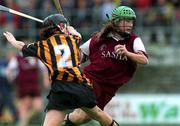 18 August 2001; Colette Nevin of Galway goes past Marie Maher of Kilkenny during the All-Ireland Senior Camogie Championship Semi-Final match between Kilkenny and Galway at Cusack Park in Mullingar, Westmeath. Photo by Matt Browne/Sportsfile
