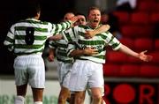 28 August 2001; Shamrock Rovers' Sean Francis, right, celebrates with team-mates Pascal Vaudequin, 8, and Jason Colwell, centre, after scoring their second goal during the Eircom League Premier Division match between Longford Town and Shamrock Rovers at Flancar Park in Longford. Photo by David Maher/Sportsfile