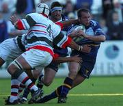 28 August 2001; Simon Keogh of Leinster is tackled by Andrew Clatworthy and Ockert Booyse, 4, of Ebbw Vale during the Celtic League match between Leinster and Ebbw Vale at Donnybrook in Dublin. Photo by Aoife Rice/Sportsfile