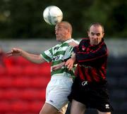 28 August 2001; Tommy Dunne of Shamrock Rovers in action against Alan Kirby of Longford Town during the Eircom League Premier Division match between Longford Town and Shamrock Rovers at Flancar Park in Longford. Photo by David Maher/Sportsfile