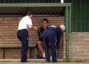 30 August 2001; Ian Harte with Republic of Ireland chartered physiotherapist Ciaran Murray, left, while sitting out a Republic of Ireland training session at John Hyland Park in Baldonnell, Dublin. Photo by Aoife Rice/Sportsfile