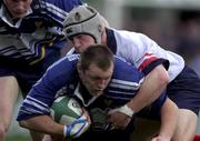 31 August 2001; Eric Miller of Leinster is tackled by Ulster's Neil McMillan during the Celtic League match between Leinster and Ulster at Donnybrook in Dublin. Photo by Brendan Moran/Sportsfile