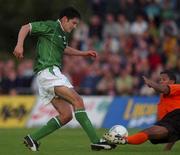 31 August 2001; Richard Sadlier of Republic of Ireland in action against Michael Lamey of Netherlands during the UEFA Under-21 Championship Qualifying Round match between Republic of Ireland and Netherlands at the Regional Sports Centre in Waterford. Photo by David Maher/Sportsfile