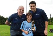14 August 2016; Paul O'Sullivan, Head of Marketing at Volkswagen Passenger Cars, and Dublin footballer Bernard Brogan presenting the Player of the Tournament Award to Shane Forbes of Belvedere at the Volkswagen Junior Masters Under 13 Football Tournament at the AUL Sports Grounds, Dublin Airport, Dublin. Photo by Sportsfile