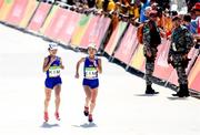 14 August 2016; Kim Hye Gyong and Kim Hye Song of North Korea on the approach to the finish line during the Women's Marathon during the 2016 Rio Summer Olympic Games in Rio de Janeiro, Brazil. Photo by Stephen McCarthy/Sportsfile