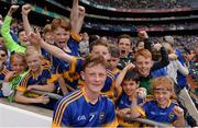 14 August 2016; Jerome Cahill of Tipperary poses for a photograph with supporters after the Electric Ireland GAA Hurling All-Ireland Minor Championship Semi-Final game between Galway and Tipperary at Croke Park, Dublin. Photo by Piaras Ó Mídheach/Sportsfile