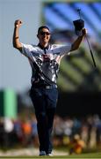 14 August 2016; Justin Rose of Great Britain celebrates winning the Men's golf competition at the Olympic Golf Course, Barra de Tijuca, during the 2016 Rio Summer Olympic Games in Rio de Janeiro, Brazil. Photo by Ramsey Cardy/Sportsfile