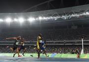 14 August 2016; Usain Bolt of Jamaica wins the Men's 100m final from Justin Gatlin of USA, right, and Andre de Grasse of Canada, left, at the Olympic Stadium during the 2016 Rio Summer Olympic Games in Rio de Janeiro, Brazil. Photo by Brendan Moran/Sportsfile