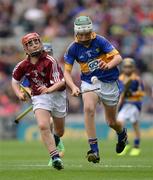 14 August 2016; Kevin Maher, Lisnakella, Oola, Co. Limerick, representing Tipperary, in action against Seán Withycombe, St Mochulla's NS, Tulla, Clare, representing Galway, during the INTO Cumann na mBunscol GAA Respect Exhibition Go Games at the GAA Hurling All-Ireland Senior Championship Semi-Final game between Galway and Tipperary at Croke Park, Dublin. Photo by Piaras Ó Mídheach/Sportsfile