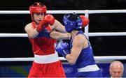 15 August 2016; Katie Taylor, left, of Ireland in action against Mira Potkonen of Finland during their Lightweight quarter-final bout in the Riocentro Pavillion 6 Arena, Barra da Tijuca, during the 2016 Rio Summer Olympic Games in Rio de Janeiro, Brazil. Photo by Ramsey Cardy/Sportsfile