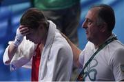 15 August 2016; Katie Taylor of Ireland is consoled by Team Ireland coach Zaur Antia after her defeat to Mira Potkonen of Finland in their Lightweight quarter-final bout in the Riocentro Pavillion 6 Arena, Barra da Tijuca, during the 2016 Rio Summer Olympic Games in Rio de Janeiro, Brazil. Photo by Ramsey Cardy/Sportsfile