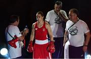 15 August 2016; Katie Taylor of Ireland walks out with Team Ireland coaches Zaur Antia, right, John Conlan and Eddie Bolger, left, ahead of her Lightweight quarter-final bout against Mira Potkonen of Finland in the Riocentro Pavillion 6 Arena, Barra da Tijuca, during the 2016 Rio Summer Olympic Games in Rio de Janeiro, Brazil. Photo by Ramsey Cardy/Sportsfile