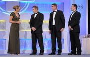 5 November 2010; MC Evanne Ni Chuilinn speaking to Dessie Farrell, Chief Executive of the GPA, in the company of Michael Duignan, 2nd from right, and Bernard Flynn, right, during the 2010 Opel Gaelic Players Association Gala Awards for hurling and football. Citywest Hotel, Saggart, Co. Dublin. Picture credit: Brendan Moran / SPORTSFILE