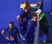 16 August 2016; Team Ireland coaches, from left, John Conlan, Eddie Bolger and Zaur Antia speak with Kevin Kilty, Chef de Equipe of Ireland following the Bantamweight Quarterfinal bout between Michael Conlan of Ireland  and Vladimir Nikitin of Russia at the Riocentro Pavillion 6 Arena during the 2016 Rio Summer Olympic Games in Rio de Janeiro, Brazil. Photo by Stephen McCarthy/Sportsfile