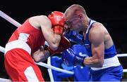 16 August 2016; Vladimir Nikitin of Russia, right, exchanges punches with Michael Conlan of Ireland during their Bantamweight quarter final bout at the Riocentro Pavillion 6 Arena during the 2016 Rio Summer Olympic Games in Rio de Janeiro, Brazil. Photo by Stephen McCarthy/Sportsfile