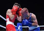 16 August 2016; Vladimir Nikitin of Russia, right, exchanges punches with Michael Conlan of Ireland during their Bantamweight quarter final bout at the Riocentro Pavillion 6 Arena during the 2016 Rio Summer Olympic Games in Rio de Janeiro, Brazil. Photo by Stephen McCarthy/Sportsfile