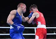16 August 2016; Michael Conlan of Ireland, right, exchanges punches with Vladimir Nikitin of Russia during their Bantamweight quarter final bout at the Riocentro Pavillion 6 Arena during the 2016 Rio Summer Olympic Games in Rio de Janeiro, Brazil. Photo by Stephen McCarthy/Sportsfile