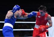 16 August 2016; Michael Conlan of Ireland, right, exchanges punches with Vladimir Nikitin of Russia during their Bantamweight quarter final bout at the Riocentro Pavillion 6 Arena during the 2016 Rio Summer Olympic Games in Rio de Janeiro, Brazil. Photo by Stephen McCarthy/Sportsfile