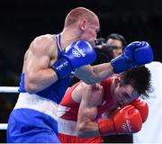 16 August 2016; Michael Conlan of Ireland, right, exchanges punches with Vladimir Nikitin of Russia during their Bantamweight quarter final bout at the Riocentro Pavillion 6 Arena during the 2016 Rio Summer Olympic Games in Rio de Janeiro, Brazil. Photo by Stephen McCarthy/Sportsfile